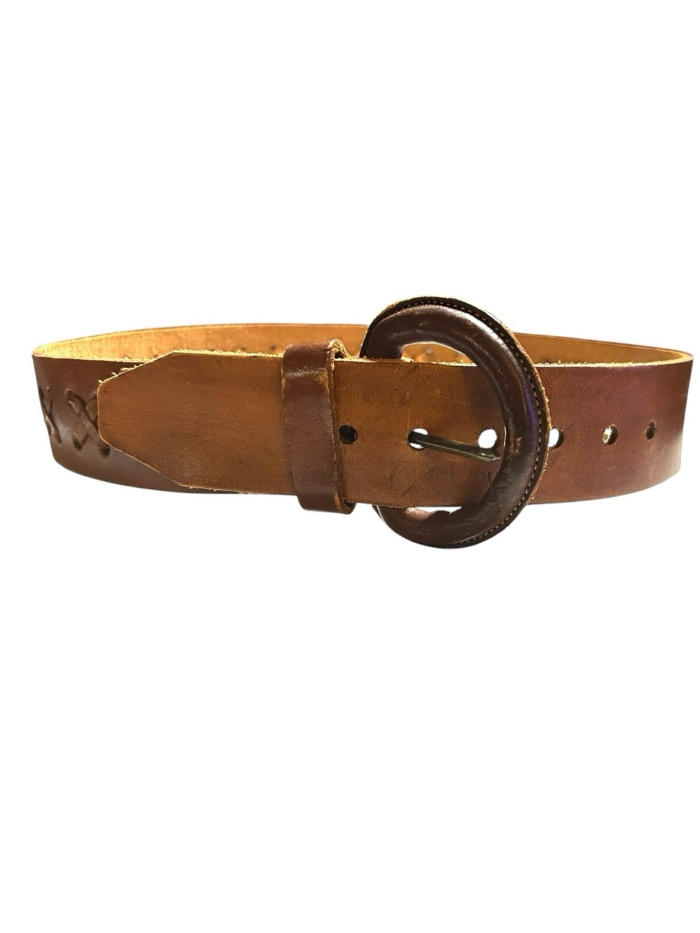 Brown leather belt with X-weave crisscross stitched along the strap.